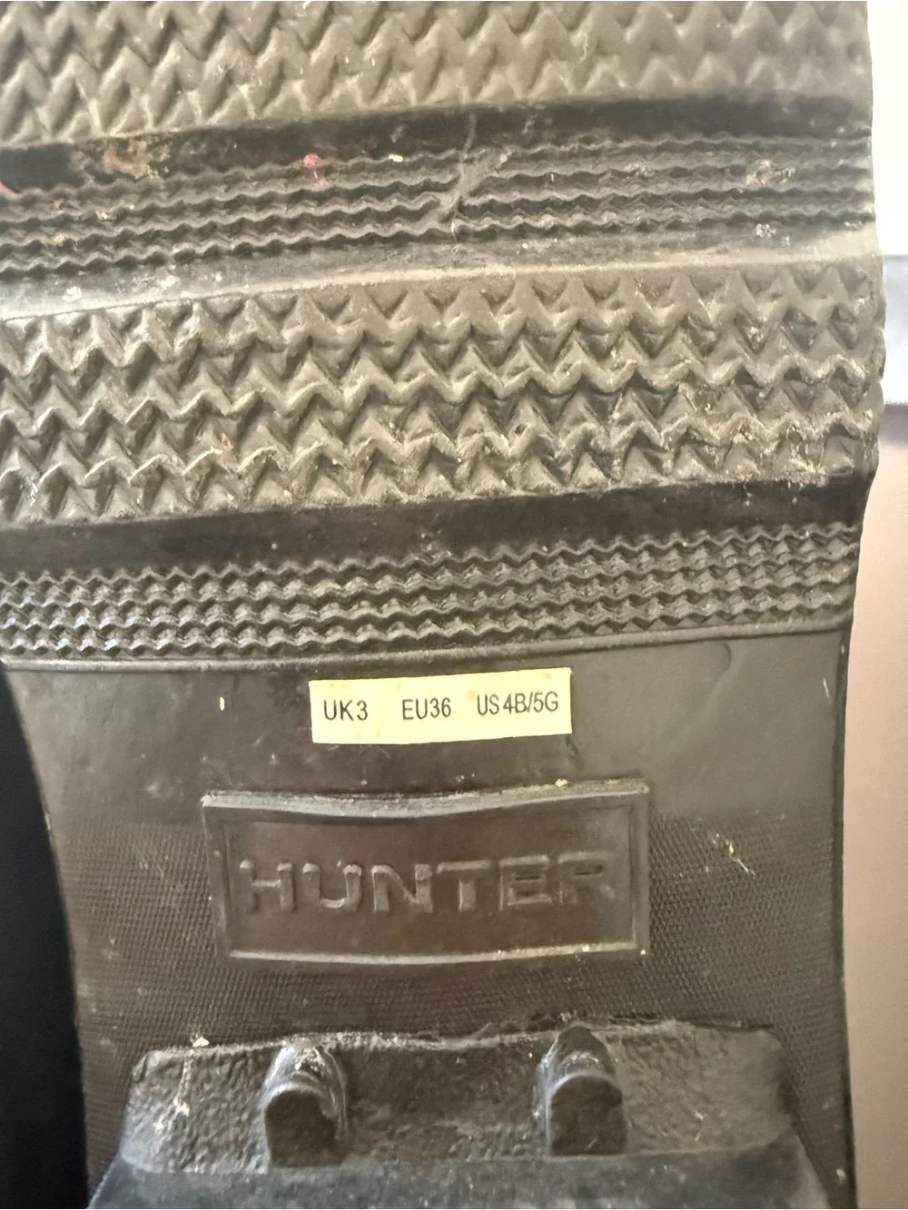 Hunter Glossy Black Chelsea Rain Boots with Red Logo